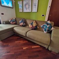 Divano letto matrimoniale con penisola contenitiva