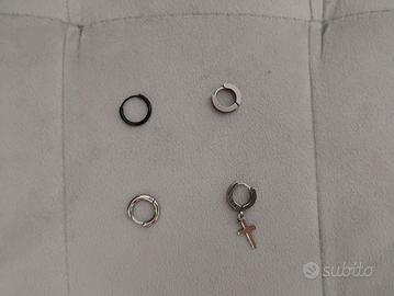 4 orecchini diversi  in acciaio 