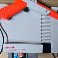 console nintendo nes con pistola + 6 giochi