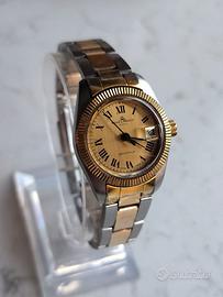 Baume Mercier   baumatic acciaio oro