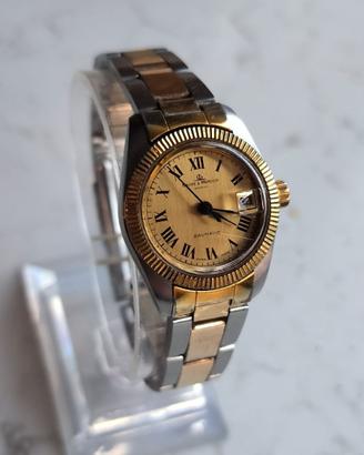 Baume Mercier   baumatic acciaio oro