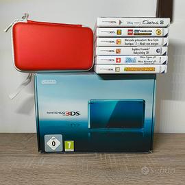 Nintendo 3DS con scatola e giochi