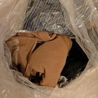 bustone con vestiti da uomo come nuovi