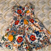 tuta corta a pantaloncini 