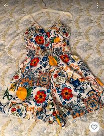 tuta corta a pantaloncini 