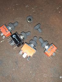 4 interruttori schermati e ricambio,più cavo luce 