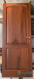 Porta in NOCE NAZIONALE FERRERO LEGNO con telaio.