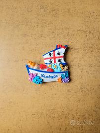 Calamita Sardegna barca