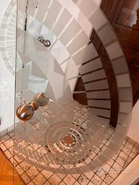 Porta in vetro - apertura stile “saloon”