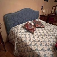 Letto matrimoniale con testata imbottita e rete ri