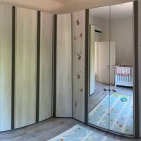 armadio con angolo  apertura ad ante