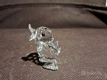 Swarovski papera in piedi