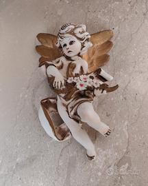 putto alato in ceramica di Capodimonte 