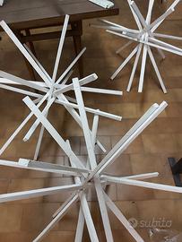 Effetto stella natale con aste legno bianco