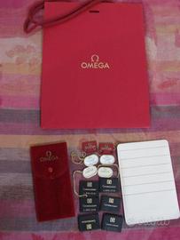 OMEGA KIT.PORTA GARANZIE.E TAG. PIU POSCHETT.
