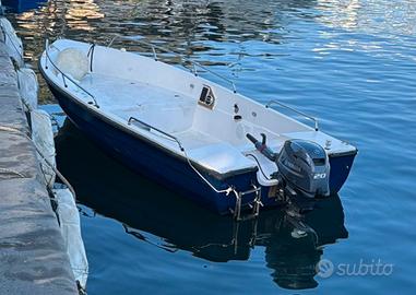 Barca - fuoribordo - reti - nasse