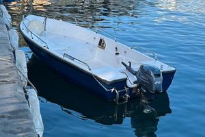 Barca - fuoribordo - reti - nasse