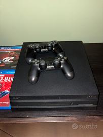 Playstation 4 Pro + sterzo e accessori