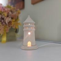 Lampada in pietra leccese