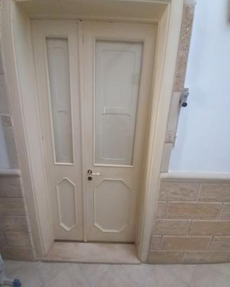 Porta in legno con vetro