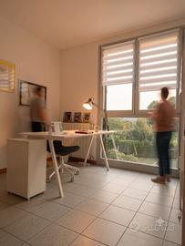 Scrivanie in coworking a Brivio