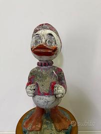 Statua da giardino paperina qui qui qua antica