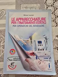 libro e apparecchiature per i trattamenti estetici