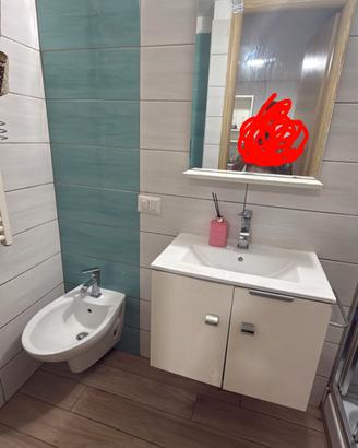 camera con bagno e angolo cottura 