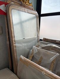 Specchi e cornici antiche dorate