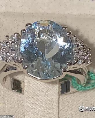 ANELLO ORO 18kt. DIAMANTI ED ACQUAMARINA OVALE