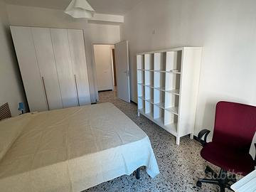 Camera singola con bagno condiviso
