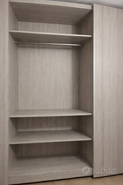 Armadio a tetto con ante scorrevoli