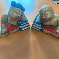 Coppia di fermalibri in legno