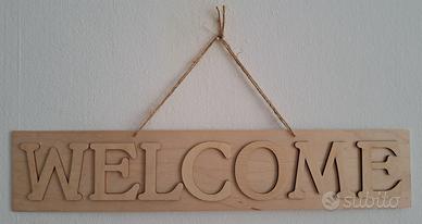 Insegna "Welcome" realizzata a mano