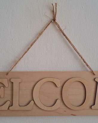 Insegna "Welcome" realizzata a mano