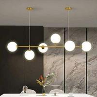 Lampadario moderno oro 6 sfere bolle bianche 