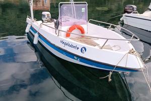 BARCA OPEN AUTOSVUOTANTE 5,50 m – MOTORE 40 CV – 