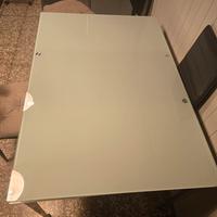 tavolo di vetro allungabile in due parti