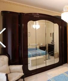 stanza da letto completa di letto con contenitore 