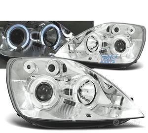FARI PER FORD FIESTA MK6 02-05 OCCHI ANGEL CROMATI