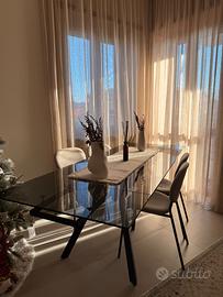 Tavolo allungabile in vetro e metallo marca STONES