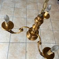 Antico lampadario in legno dorato