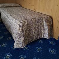 Copriletto con piumino staccabile