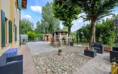 Ampio quadrilocale con giardino