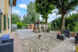 Ampio quadrilocale con giardino