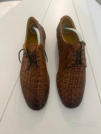 Scarpe uomo intrecciate