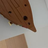 Vaiana con la barca che proietta le stelle