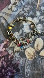 Bracciale Pandora con charme tutto originale