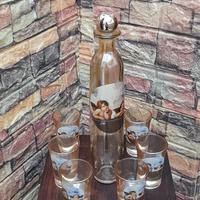 bottiglia con sei cicchetti con angeli