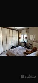 Letto contenitore matrimoniale in ciliegio